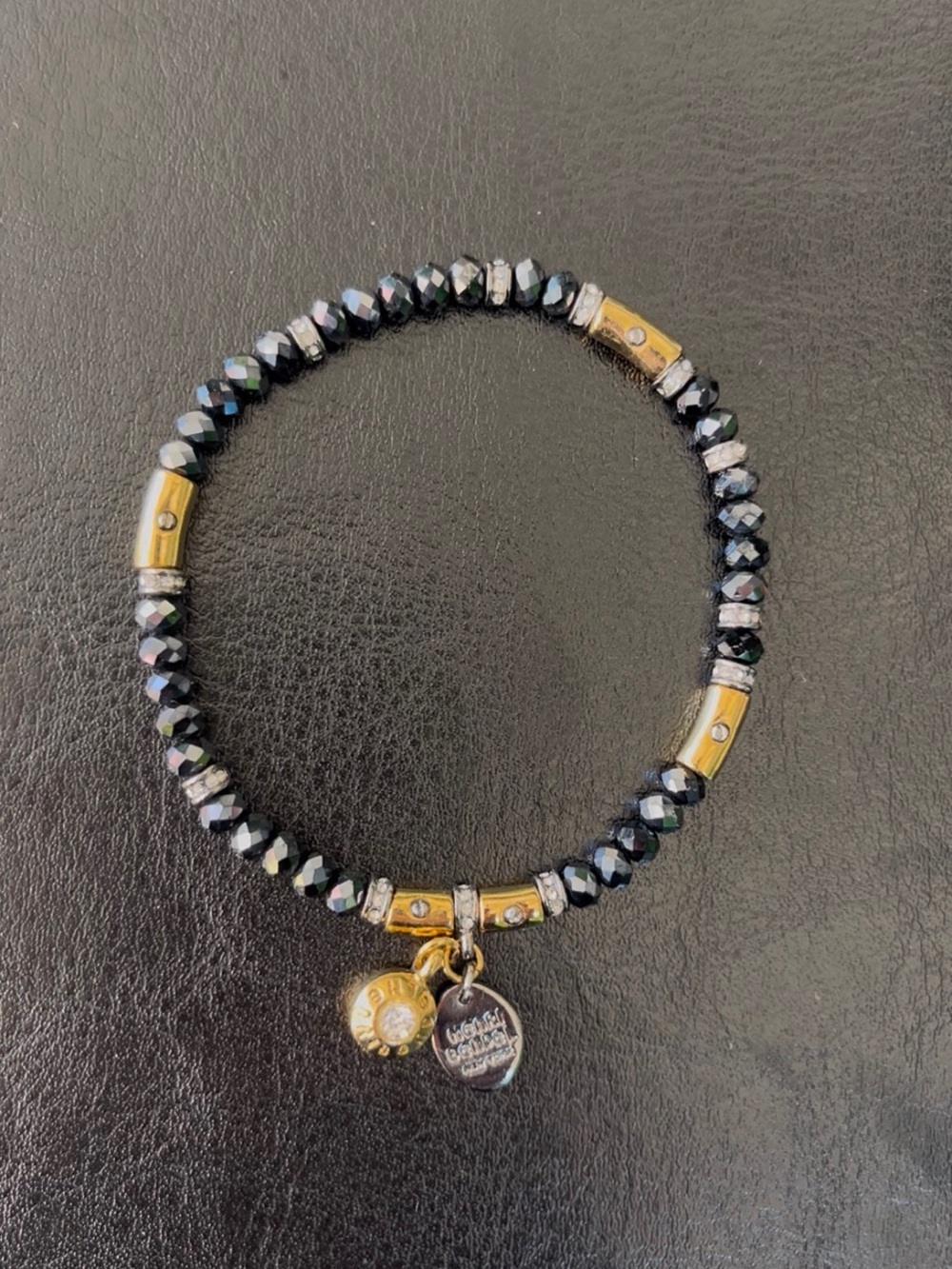 Henri Bendel The Madison Stretch Black and Gold Faceted Bead Charm Bracelet
